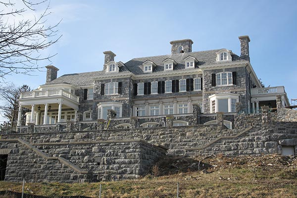 A house with slate roofing by Landmark Exteriors