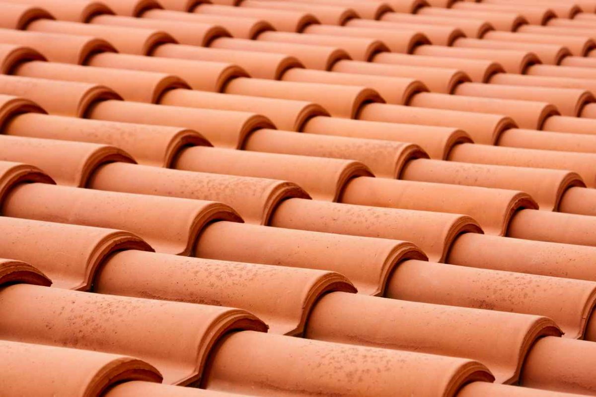 Closeup of the red clay roof tiles; benefits of tile roofing