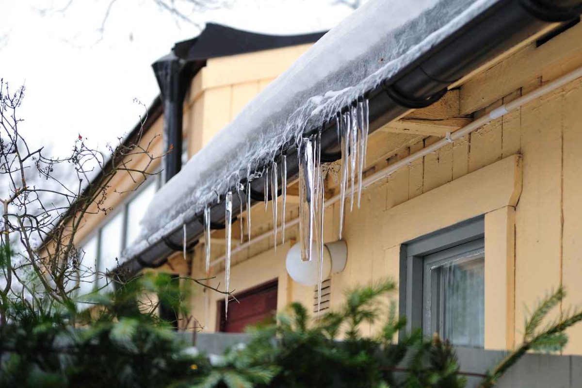 Icicles hanging off the gutter system of a home