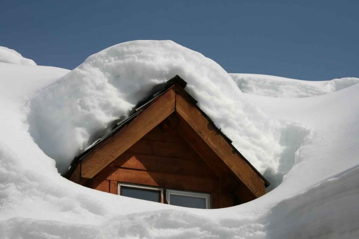 A roof buried in heavy snowfall