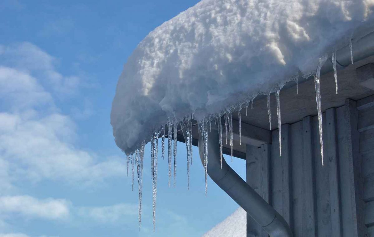How Ice and Snow Can Shorten the Life of Your Roof