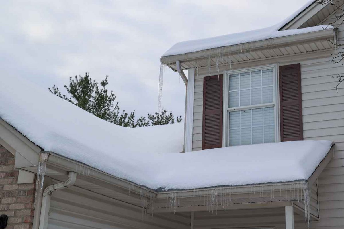 Snow covered rooftop on a home
